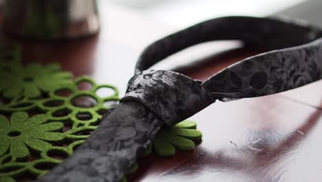 Close-up-of-grooms-tie-while-getting-ready-for-wedding-day