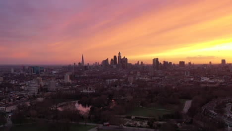 epic sunset and orange light, establishing aerial view shot of london uk, united kingdom