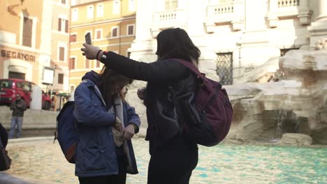 taking selfie at trevi fountain