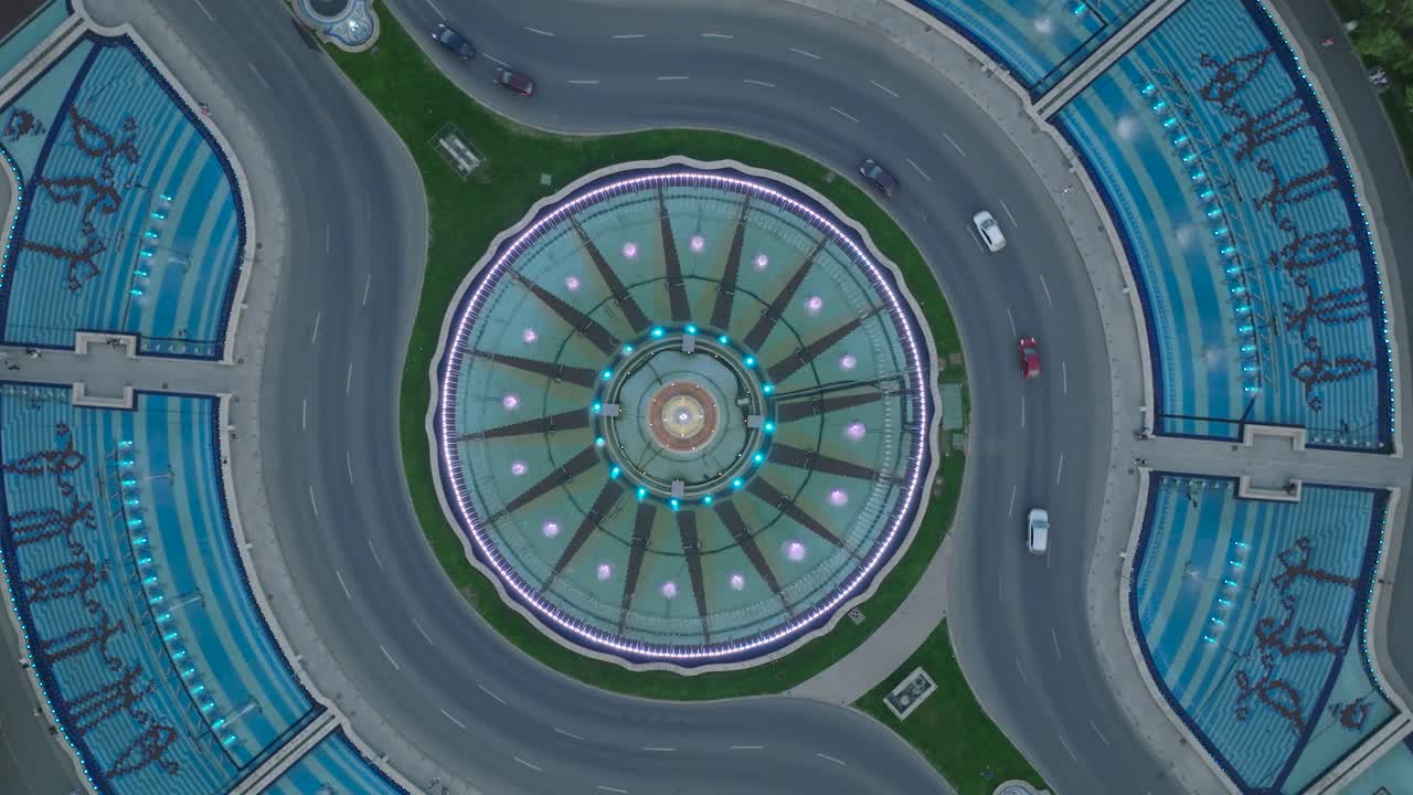 Aerial top down shot of traffic in roundabout of Bucharest city - circling shot