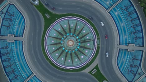 aerial top down shot of traffic in roundabout of bucharest city - circling shot