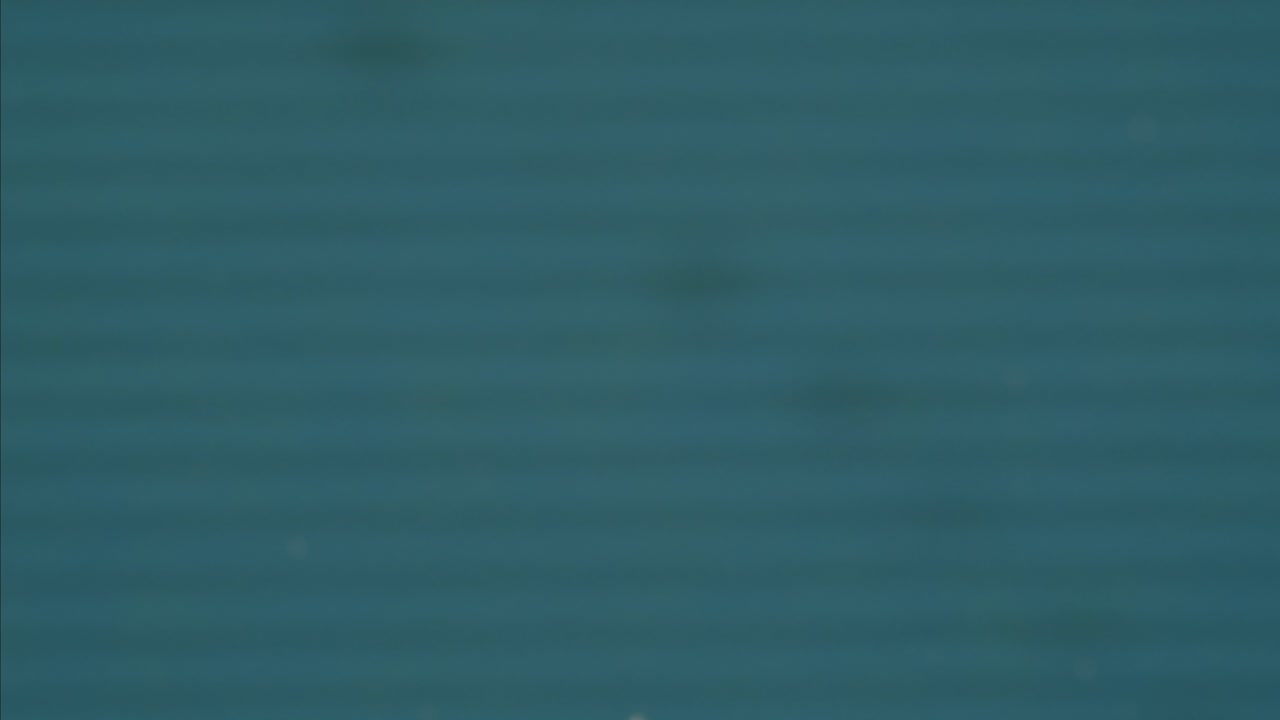 Old vintage tv television grain, vhs effect, Create a unique design with a blue noise pattern of blurred horizontal lines for a modern aesthetic