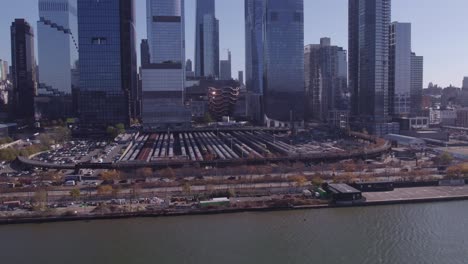 drone close-up of the hudson yards rail yard with the vessel and surrounding skyscrapers in new york city