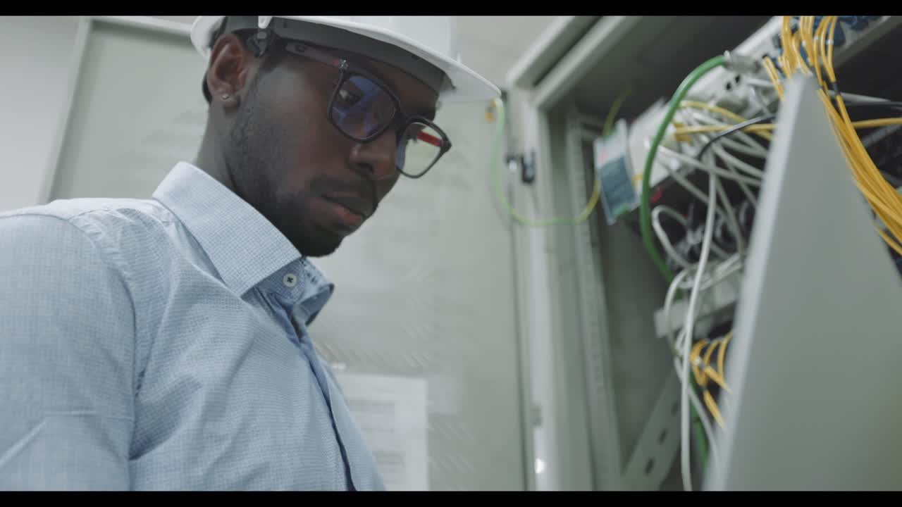Engineer working in a server room