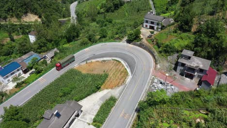 A-truck-driving-along-tea-fields-in-Hebei-Province,-China