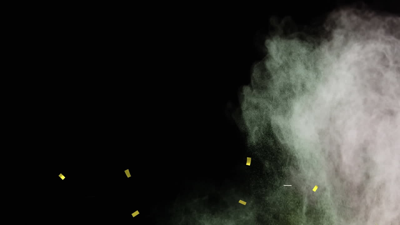 금색 콘페티가 떨어지고 빨간색과 초록색의 가루가 검은색에 떠다니는 애니메이션