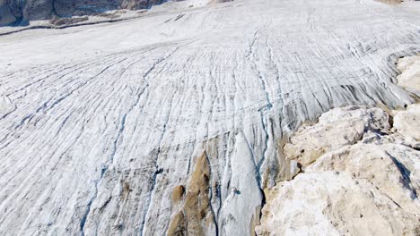 aerial views of the glacier in the north face of the marmolada mountain in the italian dolomites