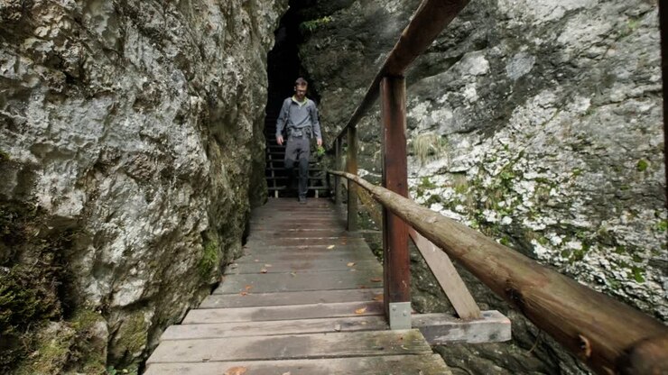 Man walking through Pokljuka Gorge in Slovenia during spring in the Triglav National Park-8