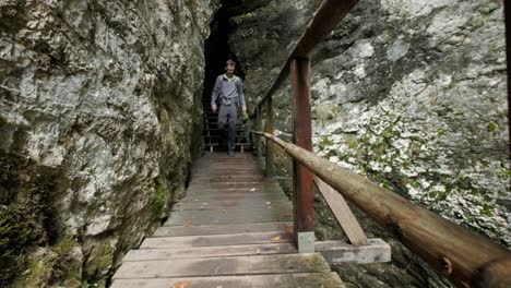 man walking through pokljuka gorge in slovenia during spring in the triglav national park-8