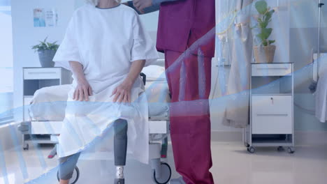 animation of dna over diverse male doctor and senior female patient with prosthetic leg talking