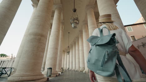 Woman with Backpack Walking Through St. Peter&#039;s Square