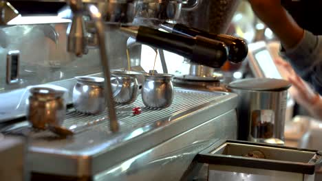 pro barista machine brewing fresh espresso for customer in downtown cafe