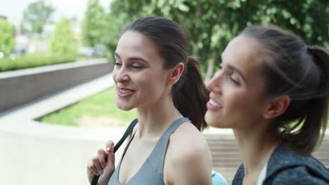 Video-of-two-women-talking-coming-back-from-training