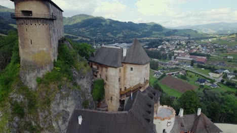 aerial view of a medieval castle in the austrian alps