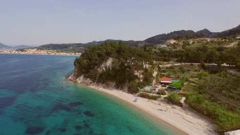 Aerial:-A-quiet-beach-on-Samos-island,-Greece