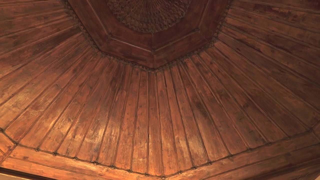 Low Angle View of Ornate Wooden Domed Ceiling
