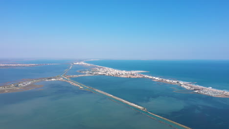 Aerial-shot-over-ponds-canal-du-Rhone-a-Sete-Palavas-les-flots-seaside-town