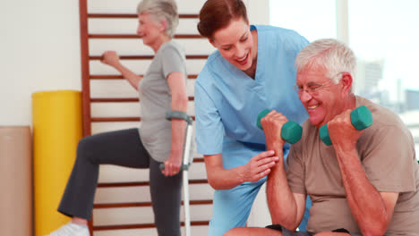 senior citizens exercising with physiotherapist