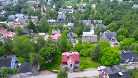 Drone-flying-over-Pispala-housing-area-in-Tampere,-Finland