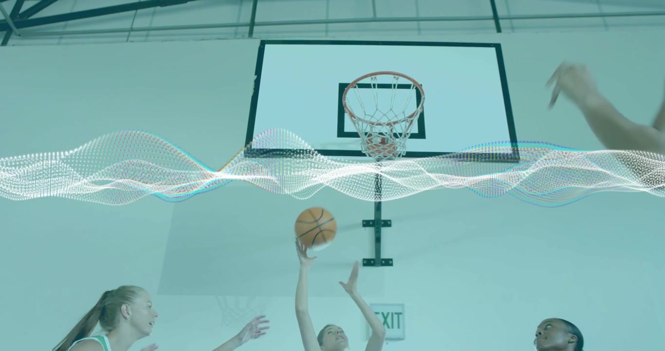 Blue and green teams jumping beneath basketball hoop after pass waveform overlay tracking rebound