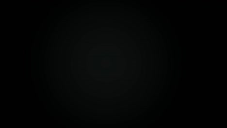 dynamic moving animation of colored light on a black background. bouncing balls are bright colors, randomly mixed