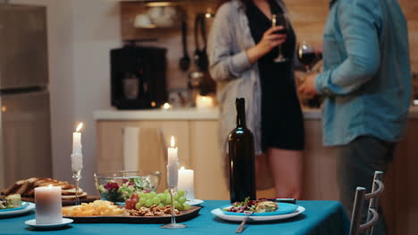 couple flirting during romantic dinner