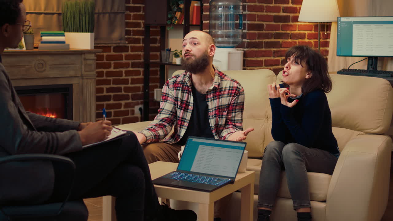 Unhappy people attending couple therapy session with specialist