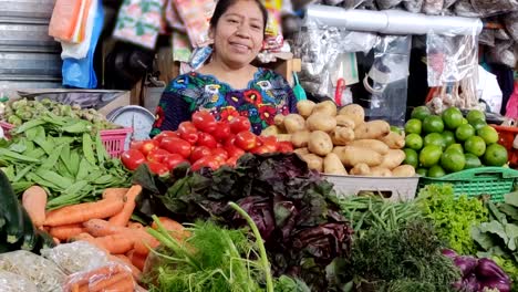 tilt up shot of mayan woman in market