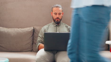 Computer,-typing-work-and-sofa-with-a-man