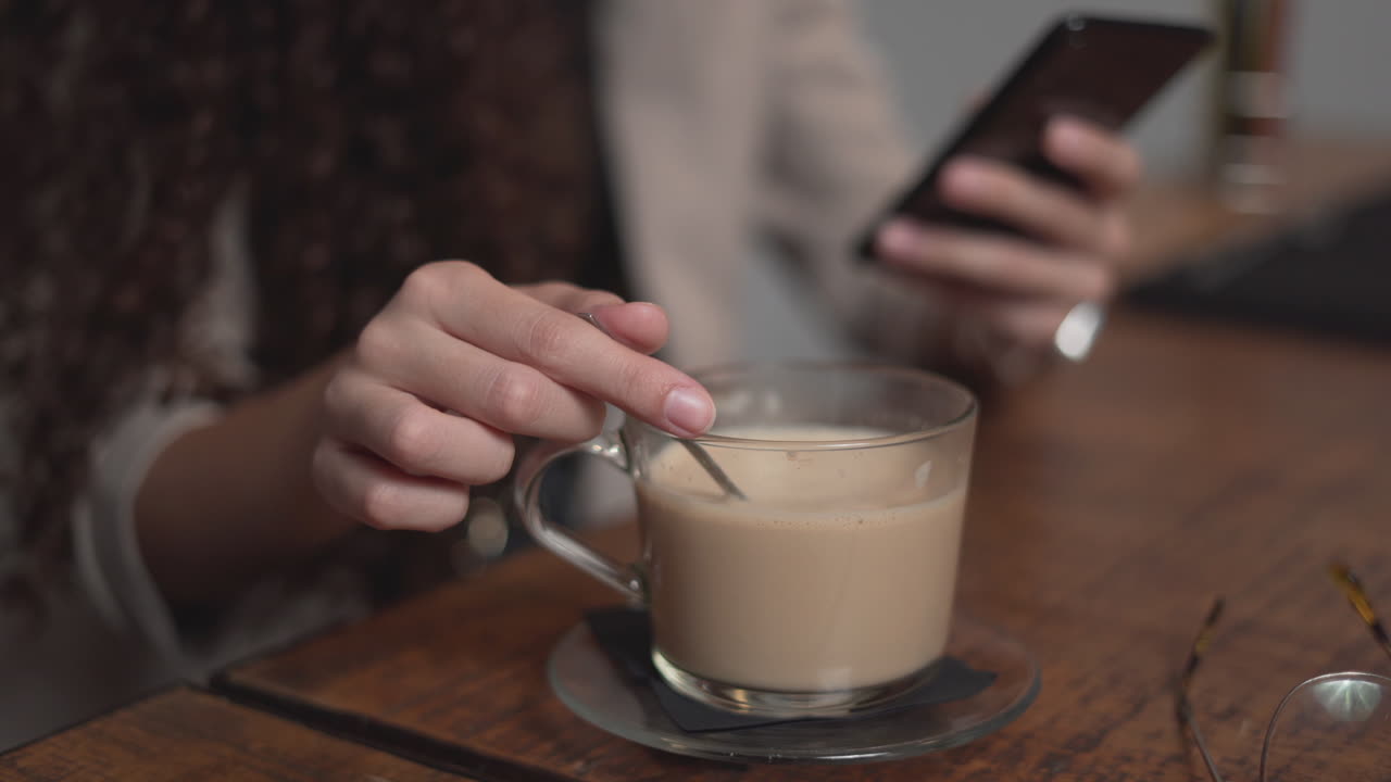 Woman enjoying a coffee at a cafe