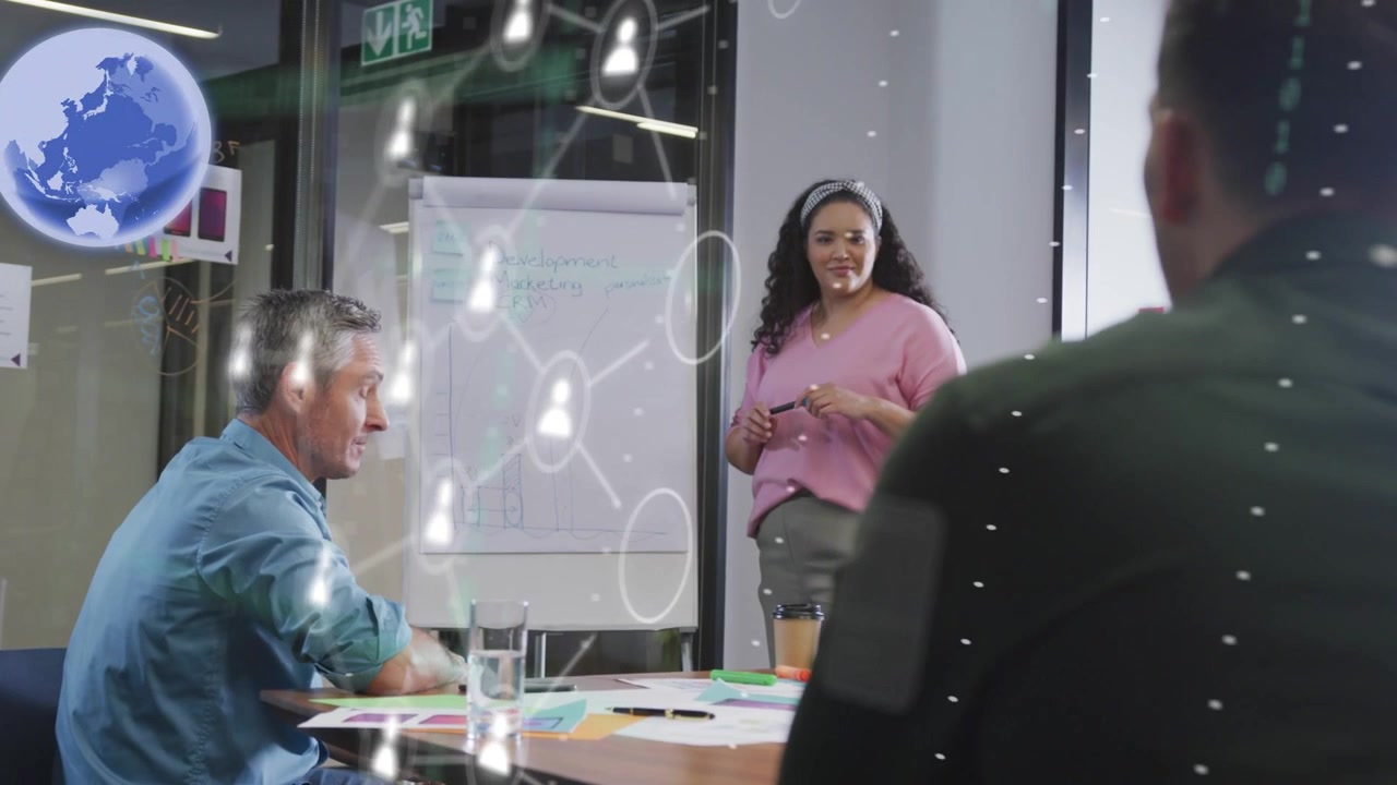 Presenter gesturing with pen and causing digital globe and user network visual in business meeting