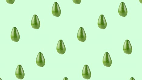 pattern with many whole avocados rotating close-up on a green background. seamless looping animation with copy space