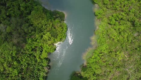 boat on a lake floating drone video top down