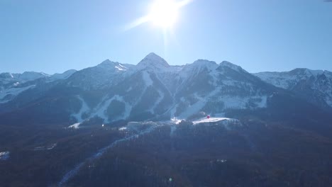 snowy mountain range with ski resort