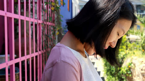 pregnant woman touching her belly near street 4k