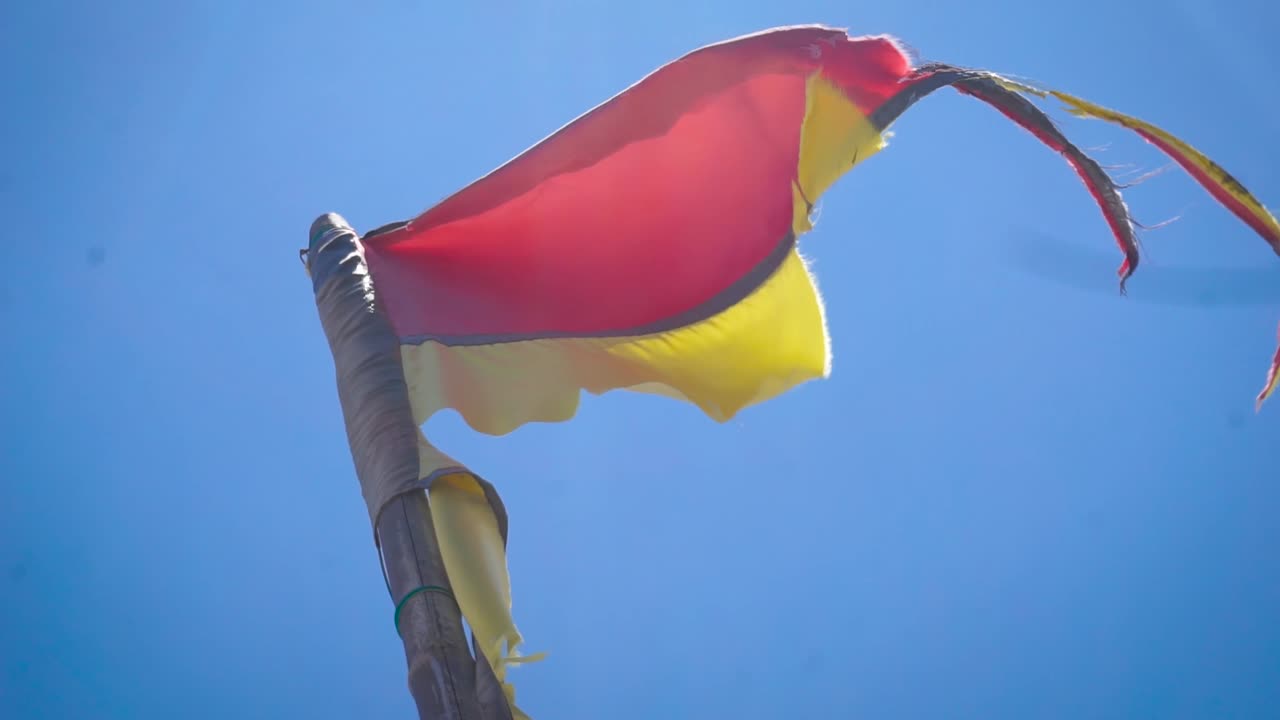 Ripped of southern Vietnam flag. 
Concept: Vietnam, Icon for storytelling