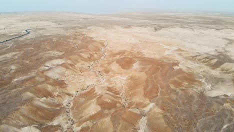 aerial view of the judean desert. flying quadcopter over desert lands near the dead sea.