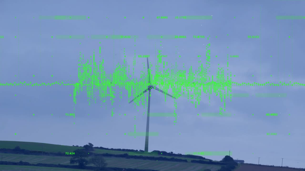 Wind turbine rotating atop rolling farmland, showing green data overlay pulsating across landscape