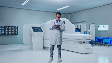 full body of asian male doctor taking note on a tablet while standing with mri machine in the hospital