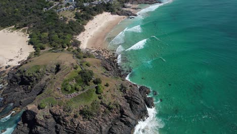 Aerial-View-Over-Norries-Head-And-Cabarita-Beach-With-Surfers-In-New-South-Wales,-Australia---drone-shot
