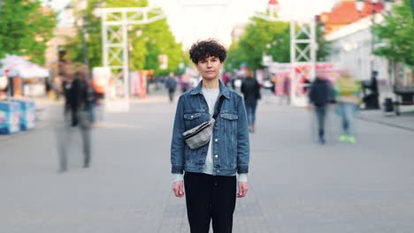 woman standing on a city street