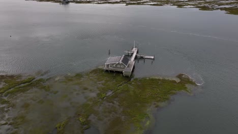 An-aerial-view-over-the-salt-marshes-in-Hempstead,-NY-on-a-cloudy-day-5