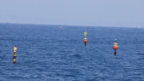 buoys floating in the sea near naples