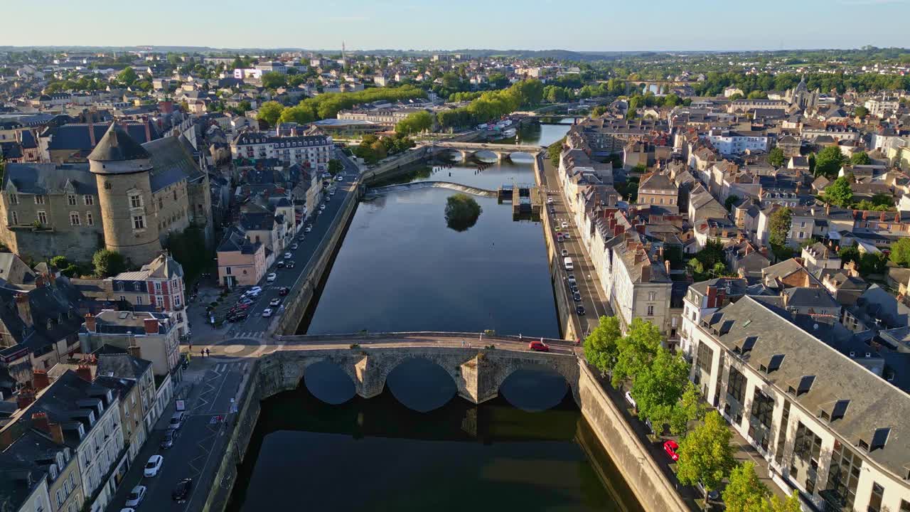 Chateau de Laval with Mayenne river and Pont Vieux bridge, aerial establishing dolly