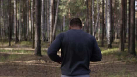 man running in the forest