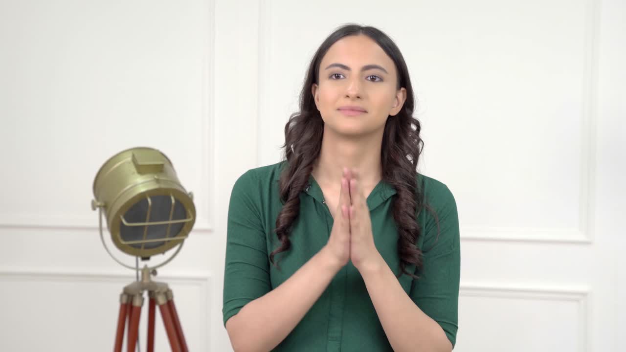 Indian woman praying to God