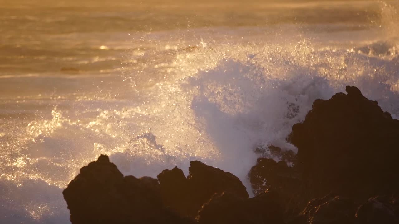 Waves Crashing Golden Hour Sunset On to Lava Rock