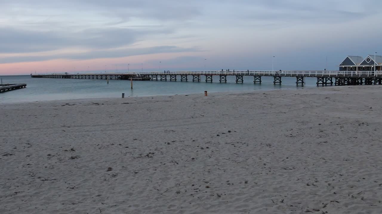 Australia Beach with Busselton Jetty Pier over Ocean Water