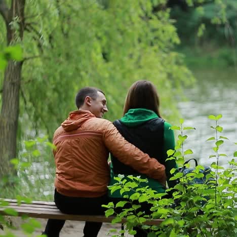 couple on bench in nature