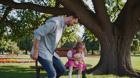father and daughter enjoying time in the park